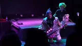2025-11-17: The Cello Goblin aka Rushadicus plays while a kid stands on his back LIVE CONDUIT FL