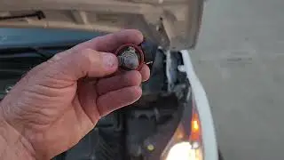 how to change a 2019 ford transit connect low beam bulb.