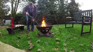 Cooking a tomahawk steak over the fire