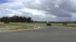 Moto2 champ Ant West sliding with Bernie Hatton - Top Rider Australia