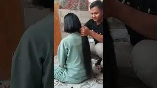 Wanita berambut panjang di potong pendek 