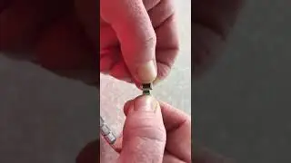 How to add a Nomination charm to a bracelet. Good luck!