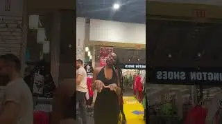 Fashionable Woman Dancing in Clothing Store#FashionDance #StyleInMotion