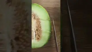 Cutting open a Haogen Melon.