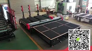 CNC Glass Cutting Machine with automatic glass loading arms and separate glass breaking table