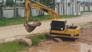 Excavator Mud Pit Challenge: Sinking or Swimming?