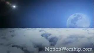 Flying Over Clouds Night with Moon Seamless Loop - by Motion Worship