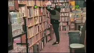 Julie Looking At Secondhand Books - MiniDV Recording