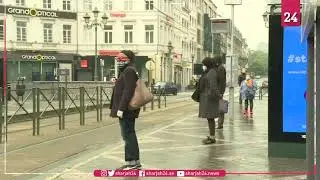 Brussels commuters wear compulsory face masks as lockdown eased