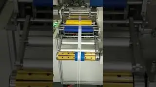 satin slitting machine cut bigger roll mateials into smaller roll