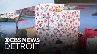 Michigan volunteers wrap gifts for foster children