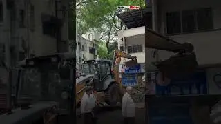 PMC Demolishes Unauthorized Structures on Dhole Patil Road