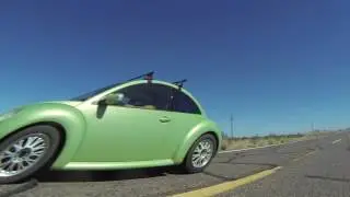 Green Volkswagen, Green Men & Aliens in Crater Range, AZ, US Border Patrol stop Traffic, GP011093