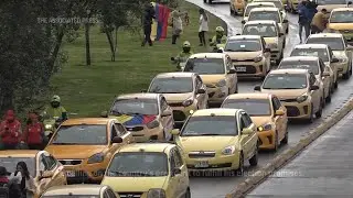 Colombian taxi drivers protest fuel costs and apps