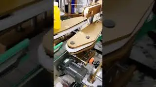 Adjusting video of bottle labeling machine with bottle spacing roll feeding system