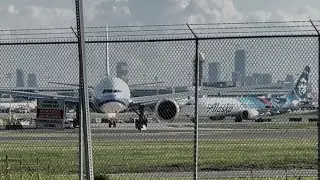 Waiting for departure China Cargo and Alaska Airlines at YYZ Toronto Pearson Airport .