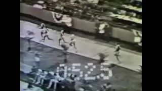 Jim Beatty breaking the 4 minute indoor mile record