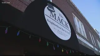 Masked gunmen rob more than a dozen at bar