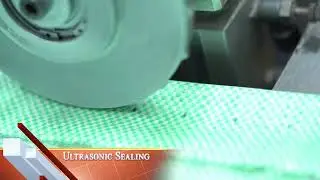 Auto Fabric cutting machine + Spout/Cross cut with Ultrasonic Edge Folding System.