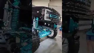 Lifted F-250 in the Mild 2 Wild Booth Slamfest 2022 in Tampa FL.