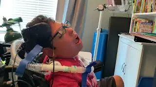 James exploring Word Power 60 with two switch auditory scanning
