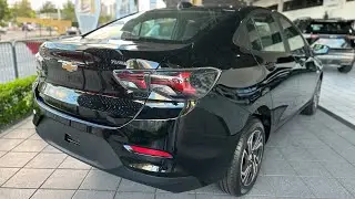 Review do nov&iacute;ssimo Chevrolet Onix Plus Turbo MT Preto Ouro Negro 2026, por apenas 115.640
