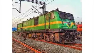 WAG9 31223 GREEN MANGO LIVERY FREIGHT ELECTRIC LOCO RESTS AT HALT