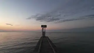Jesolo nightlife and beach sunrise