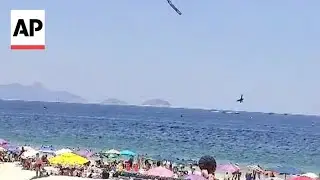 Video shows ultralight plane crash off Copacabana Beach in Brazil, killing pilot