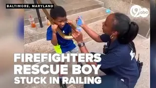 Watch: Baltimore city firefighters free child with head stuck in railing