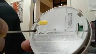 Opening Smoke Alarm Case to Better Clean with Compressed Air