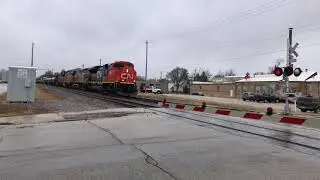 CN 8955 (SD70M-2) leads UP MALG3-24 in West Allis, WI
