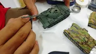 Weathering tank model with pencil