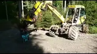 Menzi Muck M340 mit Grabenstampfer