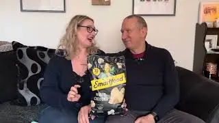 Is it worth the space in your case? British couple trying US Snacks. SmartFood Cheddar Popcorn
