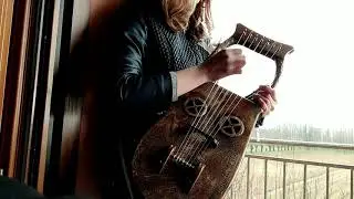 Playing the Viking Lyre on a rainy day