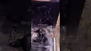 Guts in Berserker Armor Statue