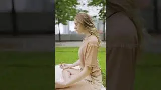 A Woman Meditating outdoors!Aman Memon1400