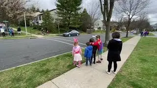 People Watch Easter Bunny Drive Through Neighborhood in Pink Limousine During Lockdown - 1113936