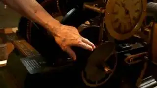 Winding the clock at Clock Tower Place