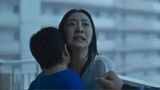As a giant wave swallows the world, one mother relives the day 20,000 times to save her son.
