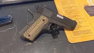 Tabletop review of an Officer Rock island 1911