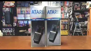 Checking out a pair of Atari 5200 controllers in the box!