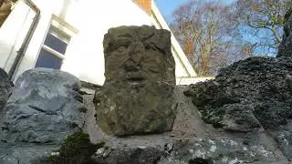 Historic medieval heads & quoins on wall in Yr Wyddgrug/Mold Sir Y Fflint/Flintshire Cymru/Wales