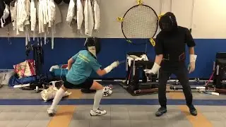 Rylan Delap teaching students of the Auburn Fencing Club
