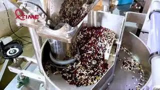 Application of fully automatic measuring cup vertical bag sealing machine in peanut packaging