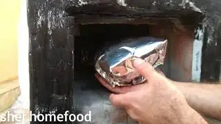 Grill chicken in a stone oven