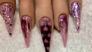 Real feather and acrylic nail art