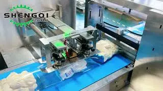 劳保手套帆布手套全自动枕式包装机Work gloves, canvas gloves, pillow-type packaging machine