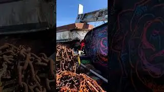 Painting a Rose on a Boat at the scrapyard - Roy Schreuder